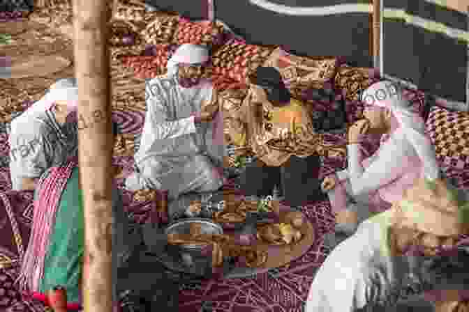 A Bedouin Family Gathered Around A Campfire, Enjoying A Traditional Meal Bedouin Life In The Egyptian Wilderness