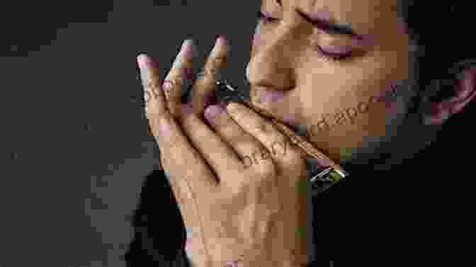 A Close Up Of A Harmonica Player Blowing Into The Instrument, Creating Beautiful Music Complete 10 Hole Diatonic Harmonica Series: E Harmonica