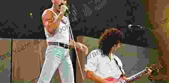 A Live Photo Of Queen Performing At Live Aid In 1985. Long Live Queen: Rock Royalty Discuss Freddie Brian John Roger