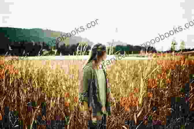 A Woman Walking Through A Field, Symbolizing Her Journey Of Transformation The Broken Half Sahar Abdulaziz