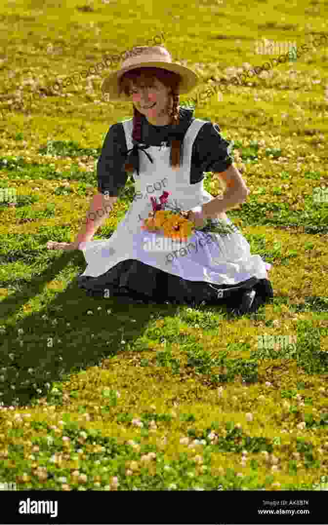 A Young Anne Of Green Gables Sitting In A Field Of Flowers Anne Of Green Gables L M Montgomery