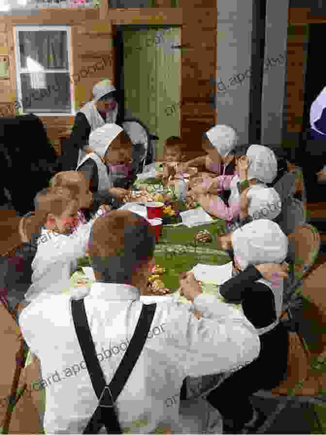 Amish Family Gathered Around A Table For A Meal Building A Future (An Amish Legacy Novel 2)