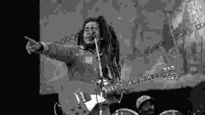 Bob Marley Performing With A Guitar, Surrounded By A Crowd. Dancehall Hit List Volume 2: A List Of The 30 Hottest Underground Dancehall Hits To Ever Touch Road DJs Sound Systems Fans Of Dancehall And Hollywood Producers Take Note