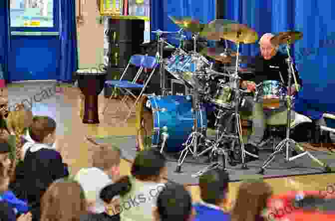 Master Drummer Sharing Knowledge And Skills With A Group Of Enthusiastic Students In A Classroom Setting Jaki Liebezeit: The Life Theory And Practice Of A Master Drummer